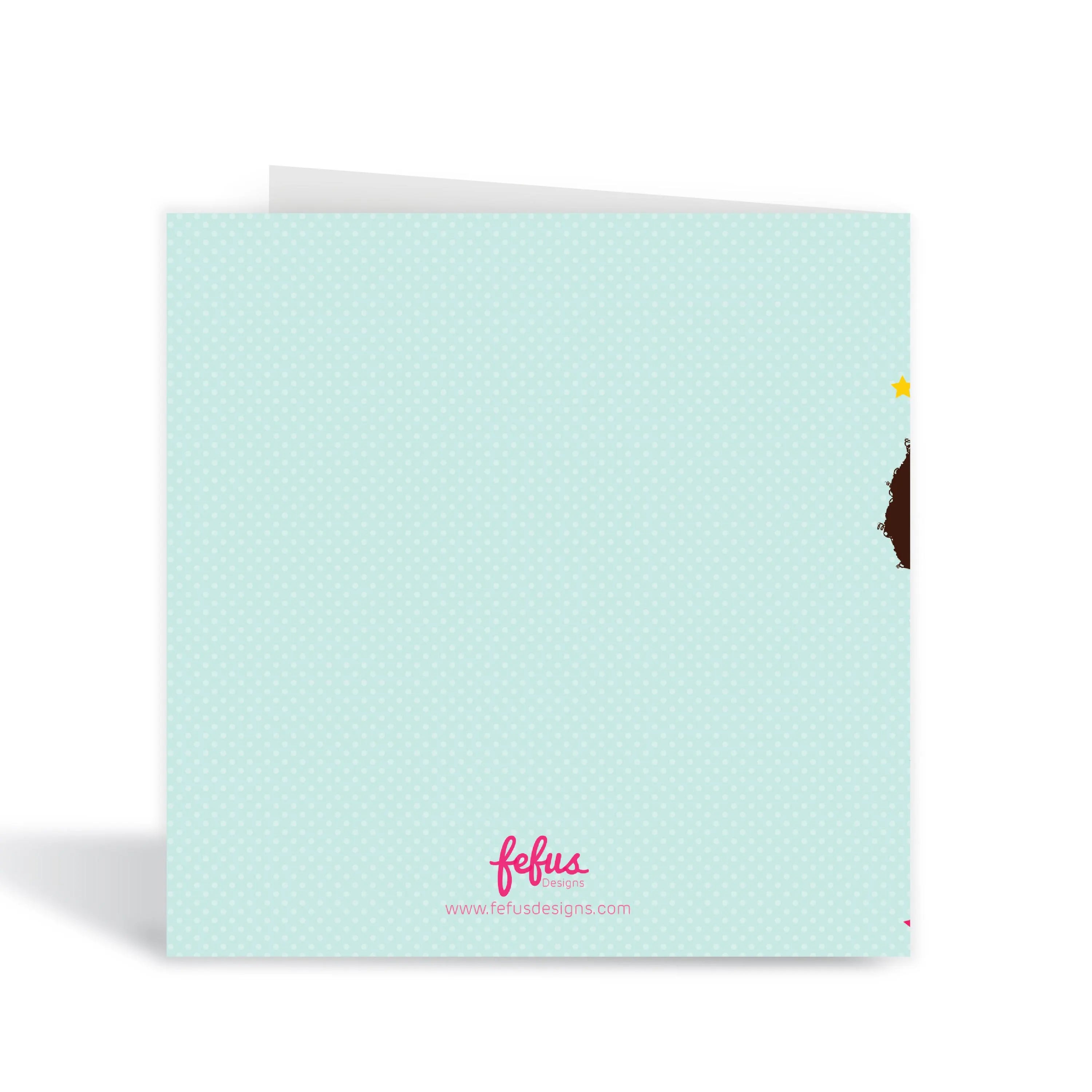 Empowering affirmation for young girls on a colourful superhero birthday card. Back view.