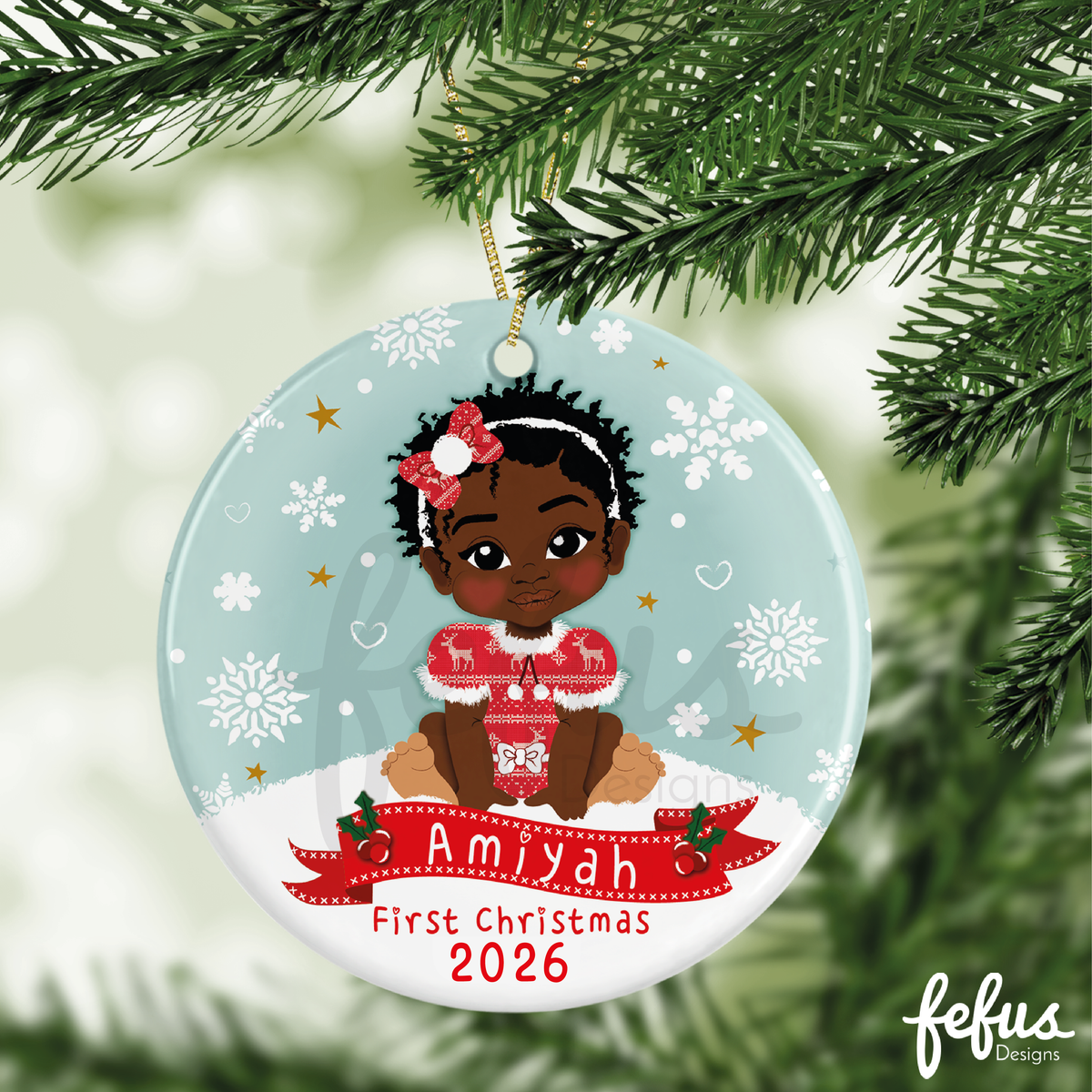 Additional product photo of the personalised Black baby girl Christmas bauble by Fefus Designs.