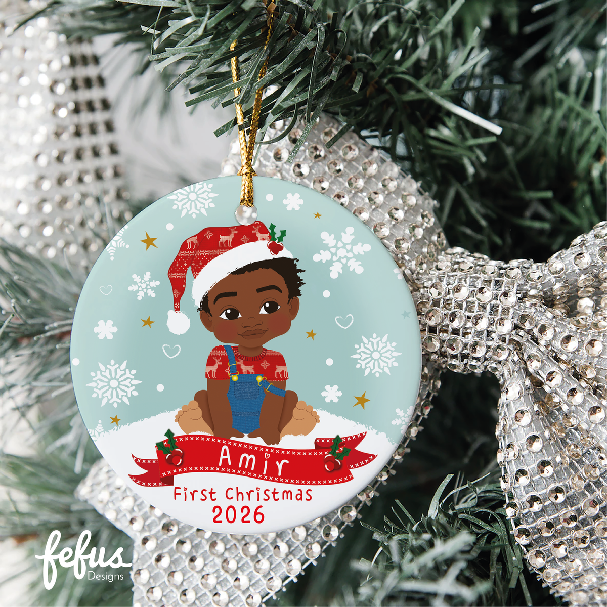 Personalised Black baby boy Christmas bauble by Fefus Designs, designed as a keepsake for the Christmas tree.