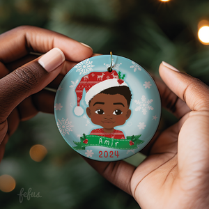 Personalised Black boy Christmas bauble by Fefus Designs, designed as a keepsake for the Christmas tree.