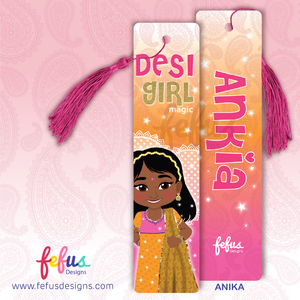 Personalised Desi girl metal bookmark by Fefus Designs featuring hand-drawn South Asian character 'Ankia'. The high-gloss aluminium bookmark showcases vibrant cultural fashion and includes a matching tassel. Ideal gift for South Asian girls – perfect for birthdays, back-to-school, or party favours.