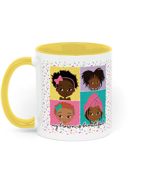 Four Brown Girls yellow-accented ceramic mug featuring four brown girl characters on the yellow version, illustrated by Fefus Designs.