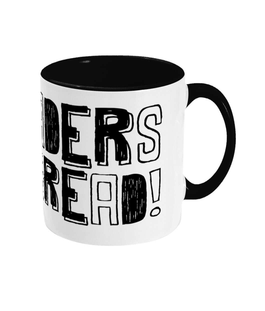 Additional view of the 11 oz ceramic mug with Hakeem, a character featured in a reading-themed illustration, by Fefus Designs.