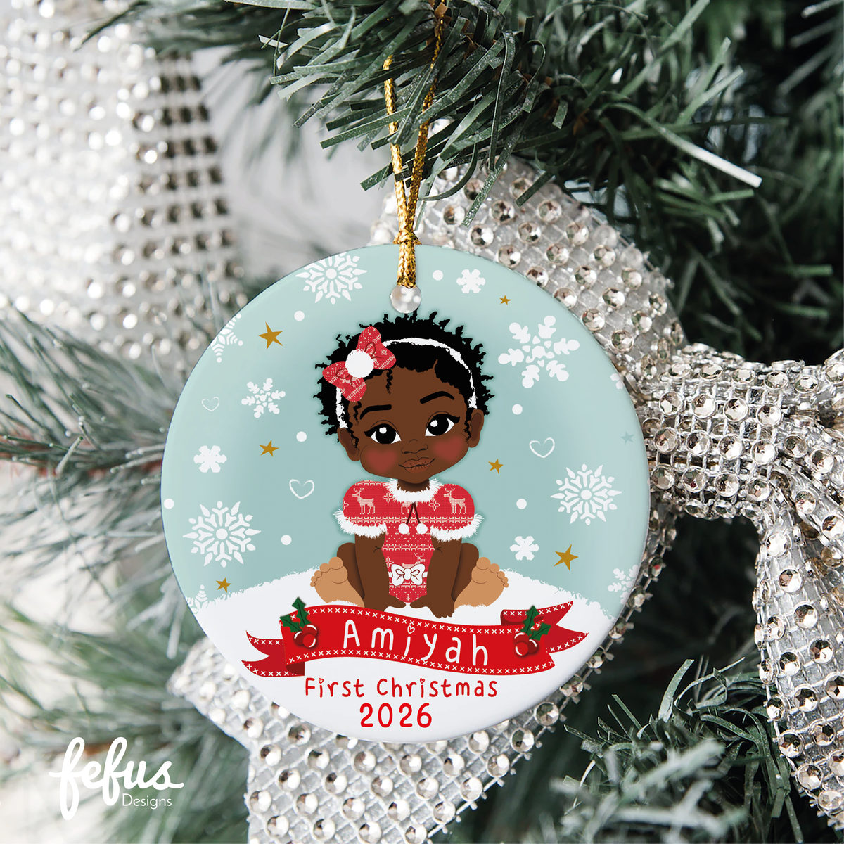 Personalised Black baby girl Christmas bauble by Fefus Designs, designed as a keepsake for the Christmas tree.