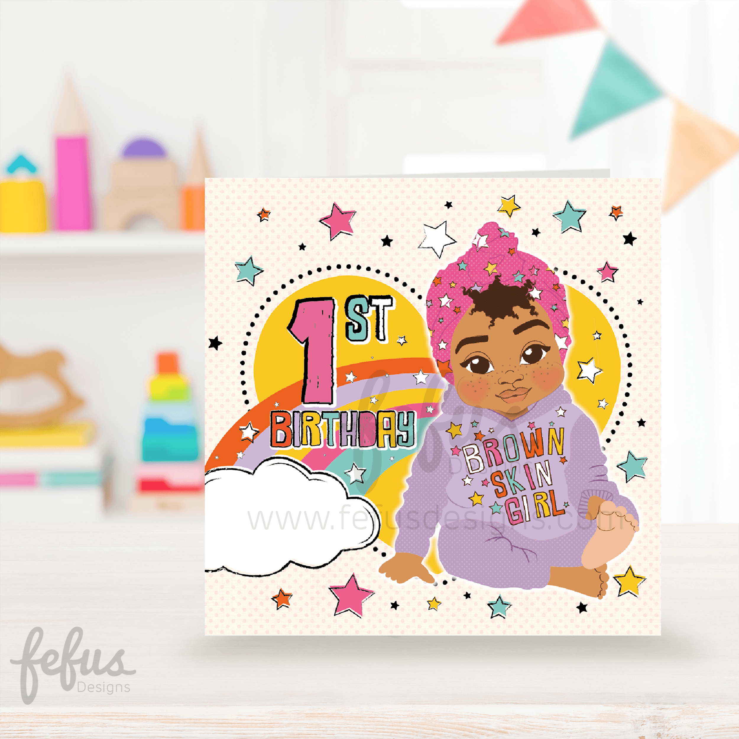 A colorful birthday card featuring an illustration of a mixed race girl with an afro, surrounded by stars and decorations, with the text '1st Birthday' and 'Brown Skin Girl'.